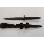 A Post War Fairbairn Sykes pattern 3 Commando fighting knife with sheath (believed to by a trophy