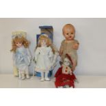 Four assorted doll figures (as found)