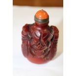 A Chinese carved snuff bottle 8cm tall