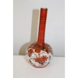 A Japanese Mieji period bottle vase decorated with butterflies & foilage (sold as seen) Height 17cm