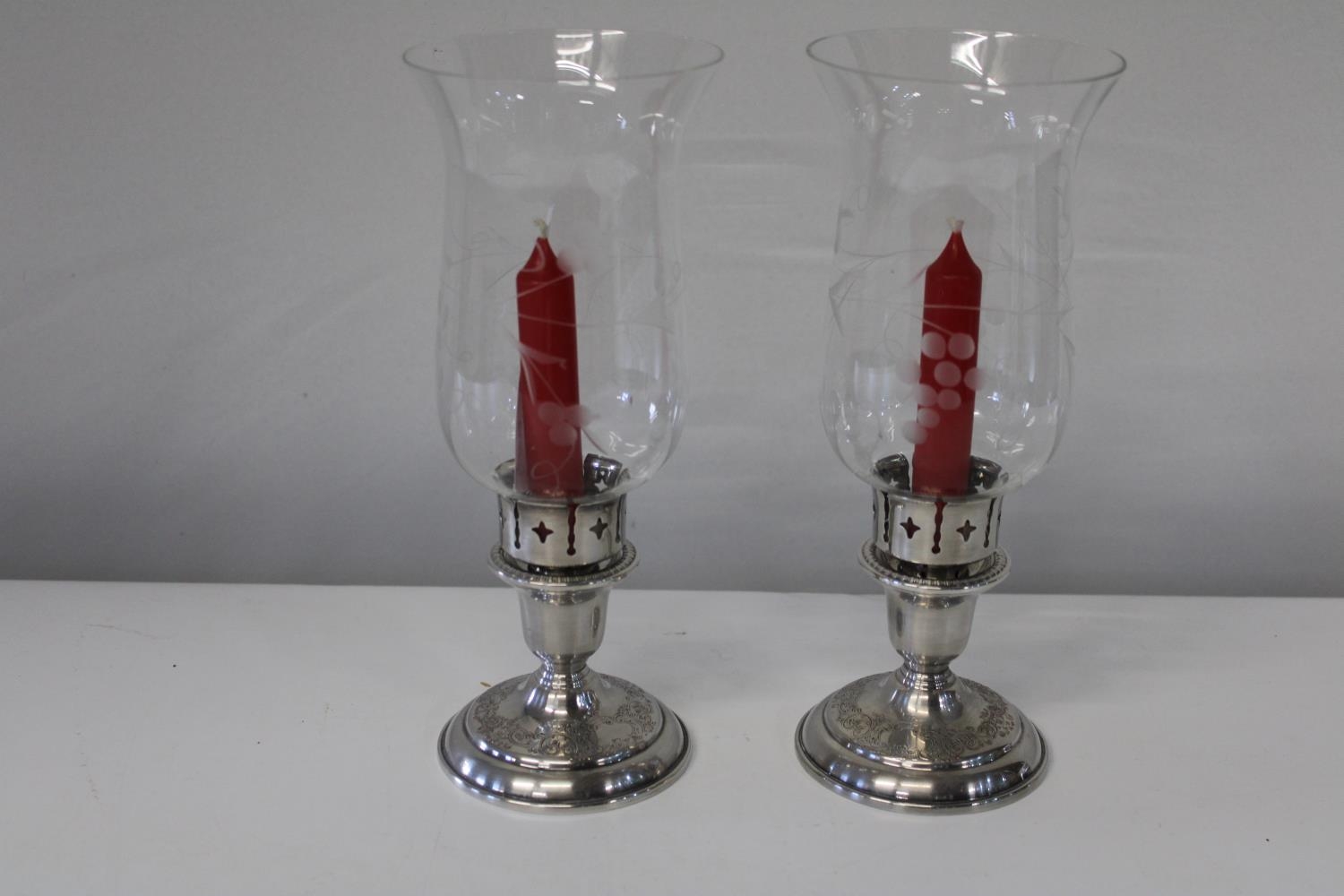 A pair of contemporary candlesticks Height 24cm