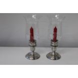 A pair of contemporary candlesticks Height 24cm