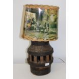 A vintage cartwheel hub table lamp & shade