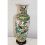 A Chinese famille verte porcelain vase from Qing Dynasty. double circle to base. (sold as seen)