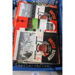 A job lot of vintage Manchester United programmes