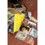 A job lot of mixed genre vinyl records etc