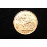 A 1907 Edward V11 22ct gold half sovereign 4.0 grams