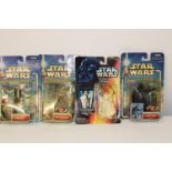 Four boxed Star Wars figures