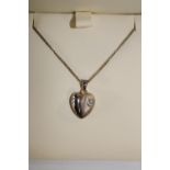 A Royal Mint moonlight silver & diamond heart pendant with silver chain