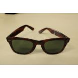 A pair of genuine Ray Ban tortoiseshell Wayfarers sunglasses