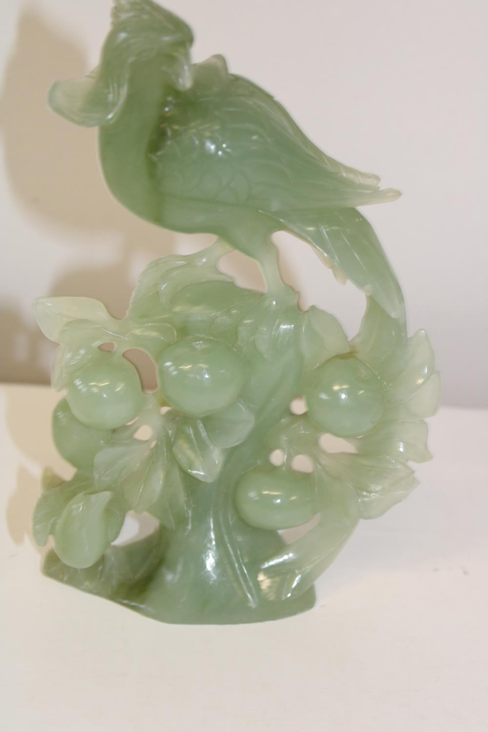 A green jade bird sculpture 21cm tall