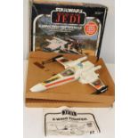 A boxed 1980's Star Wars X-Wing Fighter