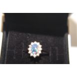 A 9ct gold opal cluster ring size M