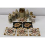 A selection of antique stoneware bottles & tiles