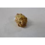 A Chinese box wood netsuke