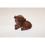 A Chinese box wood netsuke