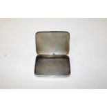 A heavy hallmarked silver lidded box with initials to the lid 8cm x 6cm