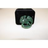 An Oriental Jade carving of aa elephant & monkey 4cm