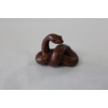 A Chinese box wood netsuke