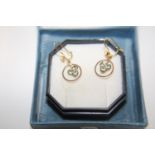 A pair of 9ct gold & blue stone earrings
