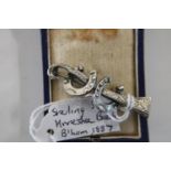 A hallmarked Victorian silver lucky horse shoe brooch