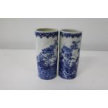 A pair of blue & white Chinese vases. Sold as seen h14