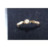 A 18ct gold diamond solitaire ring size O 1/2