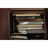 A box of assorted picture frames etc