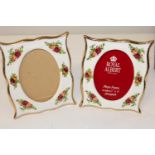 Two smaller Royal Albert OCR photo frames