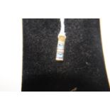 A 9ct gold & blue gemstone pendant