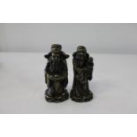 Two Oriental bronze effect Immortals h13cm