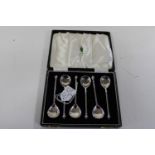 A cased set of hallmarked Sterling silver tea spoons with twisted finials