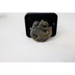 A Oriental carved jade amulet 5cm