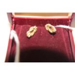 A pair of 9ct gold knot earrings