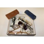A collection of vintage spectacles & sunglasses