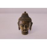 A bronze Budha head 10cm tall