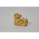 A Chinese box wood netsuke