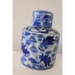 A Chinese porcelain tea cannister with marks to base h19cm