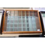 A glazed wooden dealers display cabinet with glass partitions 63x43x11cm Collection Only