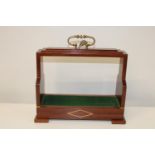 A vintage inlaid small mahogany tantalus, with key