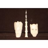 Three pieces of antique hand carved ivory Largest mask 7cm