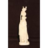 An antique hand carved ivory Immortal figure, signed to the base 18cm tall without stand