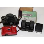 A box of cameras & other items