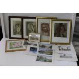 A box of assorted framed artwork etc