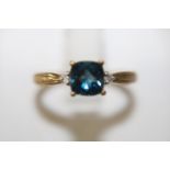 A 9ct gold & blue topaz ring 2.0 grams size N