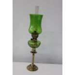 A quality brass & glass oil lamp 50cm tall