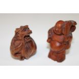 Two hand carved netsukes (Buddha & dragon)