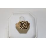 A 9ct gold patterned ring 5.0 grams size T 1/2