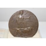 A WW1 bronze death plaque (Death Penny) awarded to Jacob Bickerdike
