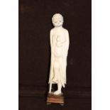 An antique hand carved ivory Immortal figure. H 19cm